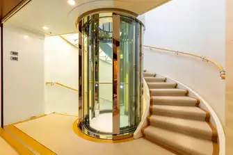 Beautiful and functional, enjoy a ride in B2's glass elevator 