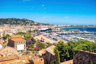 Looking across the old town of Le Suquet to the Old Port and the Palais des Festivals