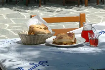 Treat your taste buds to local delicacies of Folegandros. Don't miss the kalasounes 