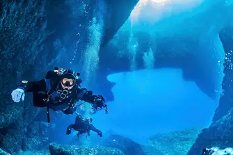 Deep dive underneath the surface and explore the caves and arches around the coast of Gozo