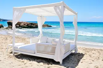 Enjoy a lovely lazy afternoon with a stunning panoramic view on over sized daybeds