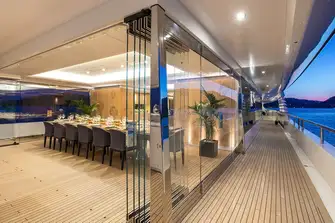 Full-height sliding glass walls create winter gardens, light-filled spaces that can be open to the elements or closed and climate-controlled for use in any weather