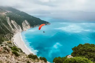 Kefalonia's Myrtos Beach provides white sand and tranquil blue water, the perfect haven for the waterborne 