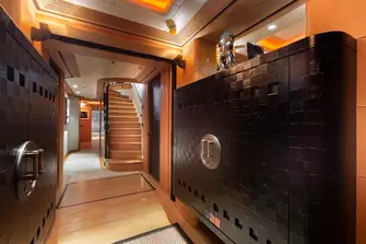 Incorporating storage solutions into corridors adds to the overall design and allows for a multi-functional space 