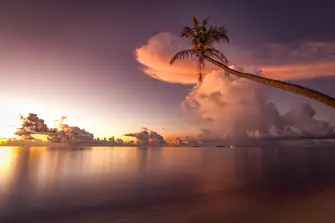 Enjoy stunning sunsets and a glass of something festive this Christmas in the Maldives 