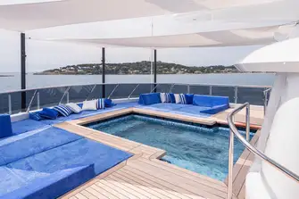 The sun deck's mosaic-lined pool