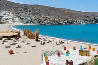 Swim in the tranquil waters or lay in the warm golden sand at Kolympithra beach, on the north coast of Tinos 